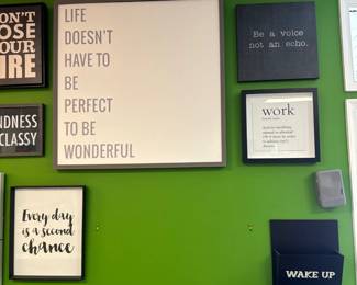 collection of framed inspirational quotes 