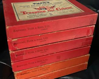 Collection of wooden puzzles - notes on missing pieces written on each box