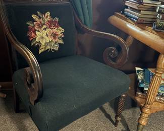 Antique chair with needlepoint cushion
