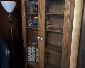 Glass display cabinet, Antique button collection (mounted), Antique lamp