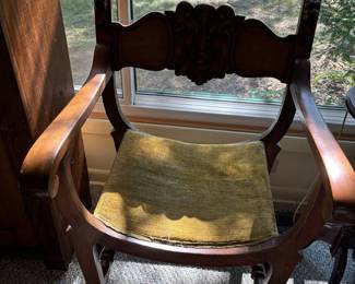 Stomps-Burkhardt carved Antique saddle chair