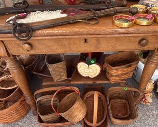 Vintage table, Longaberger Baskets, large variety of baskets.
