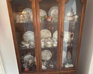 China Cabinet. Lots of china teacups, plates, collectibles..