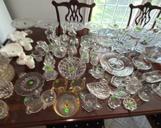 Lots of pretty glassware. Fostoria, Fenton American Cubist, Fostoria Ruby Red.
