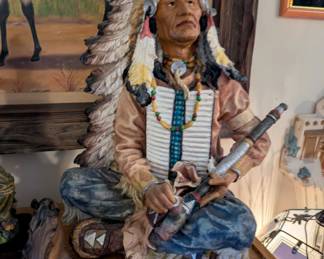 Native American figure with headdress