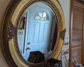 Large ornate oval mirror