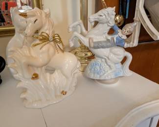 Unicorn figurines, right one being a music box