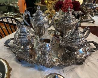 2 Reed and Barton silverplated tea sets matched -both with coffee and tea pots and creamers /sugars/waste pots . 