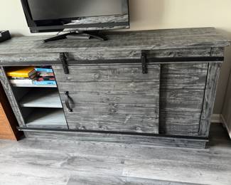 storage console with sliding doors in gray driftwood
