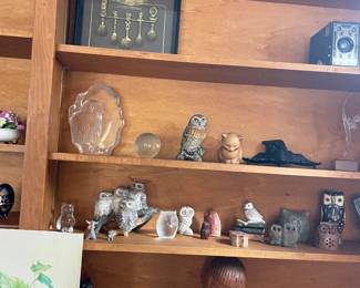 Korean collectible spoon set, vintage camera, owl figurines, wooden carved sculptures, trinket dishes, watercolor paintings