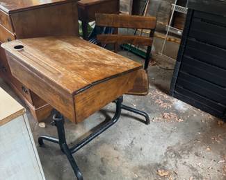 vintage wood and iron schoolhouse desk and attached swivel chair