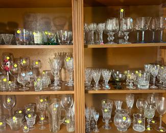 Porcelain and glass tableware most $5-10, various glass drinkware most $1-5 each, white Limoges style porcelain dinnerware set (approx. 70 pcs) $100
