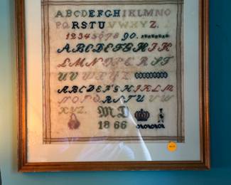 Framed needlework sampler $25