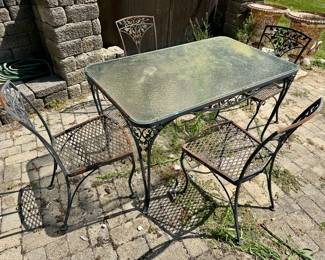 Iron garden table and four chairs