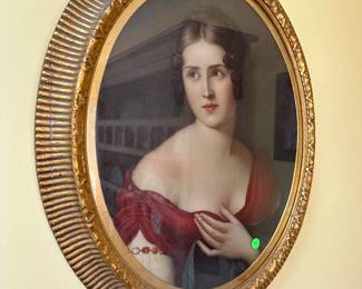 Oval framed portrait of a woman $50