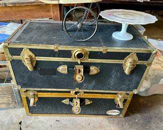 Garage items, including vintage trunks, glass cake stand