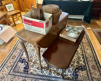 Taller Mahogany drop leaf table $100, smaller Cherry drop leaf table $50, green transferware dishes $10 for the box, clockwork $50