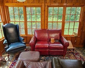 Leather Arm Chair, Leather Settee, Oriental Rug.