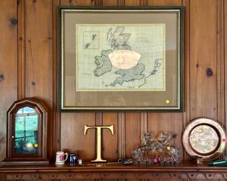 Framed antique map $100, pair of glass horse bookends $25, group of toy lead soldier $10, mugs and candle snuffer $5-10, copper charger $10