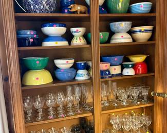 Pottery bowls and Pyrex most $10-25, large pitcher $50, glassware most $1-10 individually and in groups