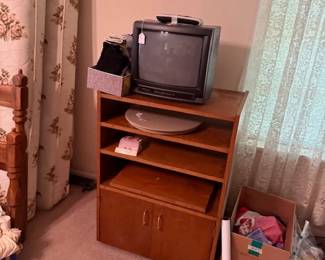 Wooden stand with TV that works