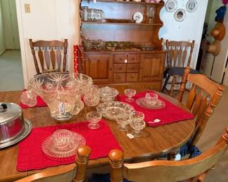 Colonal Large table with 6 chairs and wooden hutch with drawers and cabinets, lots of glass ware from punch bowl to dessert pieces