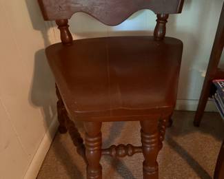 Triangular wooden chair