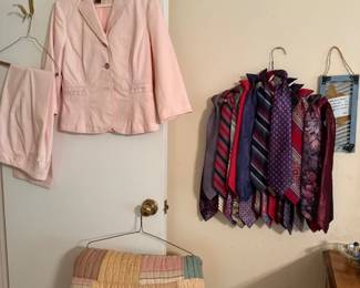 Lots of clip on ties, vintage quilt and women's clothes