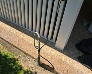 Perfect Flame barbeque is attached to a gas line