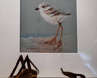 Bras cricket and small painting