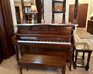 Baldwin upright piano with bench