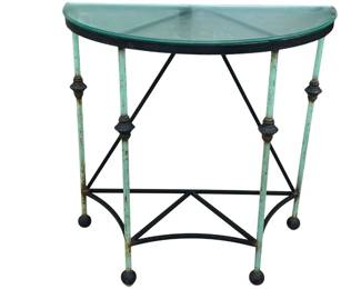 Very nice iron and patinated surface demilune table with glass top. Super finish!