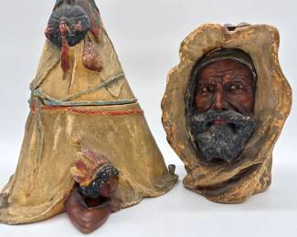 Pair of earth toned chalkware and terracotta figural tobacco jars