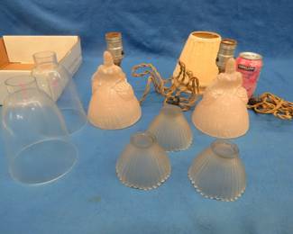 Lot 22. Two art deco pink glass lamps with no shades. Seven shades.