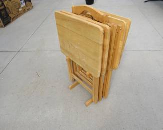 Lot 116. Four wooden tv trays with stand
