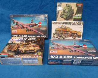 Lot 215. Five plastic models: Meng Sherman tank,Tamiya German Hanomag, Minicraft B-24D, Minicraft B-24D, Monogram Panzer IV tank 