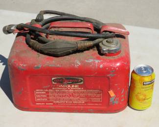 Lot 242. Three one-quarter-gallon Kiekhaefer Mercury boat gas can