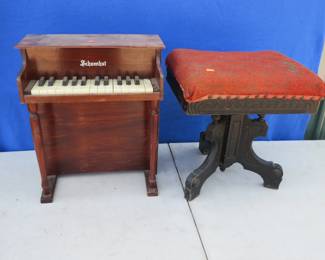 Lot 248. Real swivel piano stool and a toy piano that mostly works