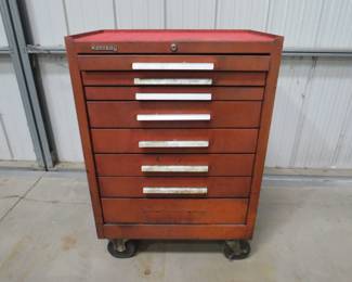 Lot 427. Rolling Kennedy toolbox with 8 drawers and contents, the bottom drawer is missing the handle. 39" x 27" x 18".