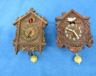 Lot 435. Two vintage animated wall clocks for parts or repair