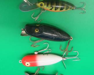 Lot 44. Vintage Shakespeare 1 1/2" Dopey, PawPaw 9300-style bait, Heddon Baby Torpedo, and a Thin Fin Hot 'N Tot.