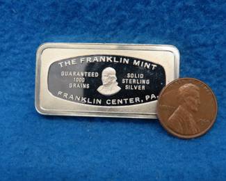 Lot 358. Franklin Mint Bank-marked sterling silver ingot. 65.33 grams