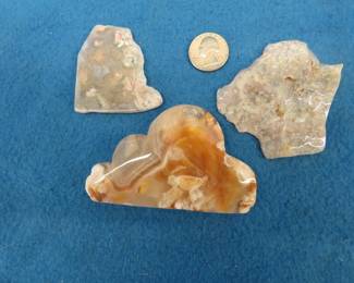 Lot 491. Two Flower Agate slices and a Flower Agate Cloud Carving. Total weight .40 lb.