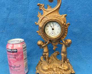 Lot 328. Antique non-working clock in an Art Nouveau style cast metal frame in very good condition