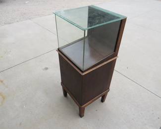 Lot 485. Display case with tempered glass. 16" x 16.5" x 42". Missing bottom door