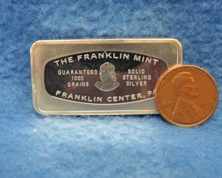Lot 357. Franklin Mint Bank-marked sterling silver ingot. 65.24 grams.