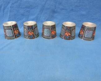 Lot 438. Five hand-painted glass shades for a ceiling light