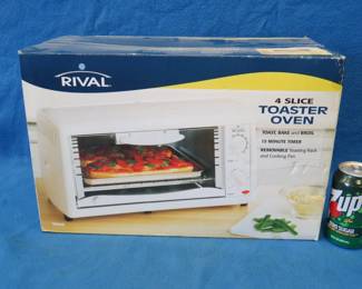 Lot 94. New-in-the-box Rival 4-slice toaster oven