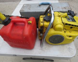 Lot 32. McCulloch chain saw with compression, gas can, and tool box