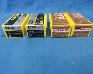 Lot 418. Speer 50 cal. bullets. 325-grain. Two unopened boxes of 50 each. 100 total. Two empty boxes for 50 cal. rounds.